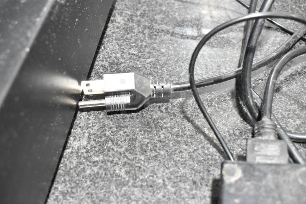 Cables and plugs for Cecilware 721350 cash drawer and Epson receipt printers on black countertop.