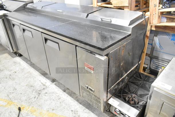 2019 Atosa P-93-GR stainless steel pizza prep table with black stone cutting board, commercial casters, 115V, 1 phase.