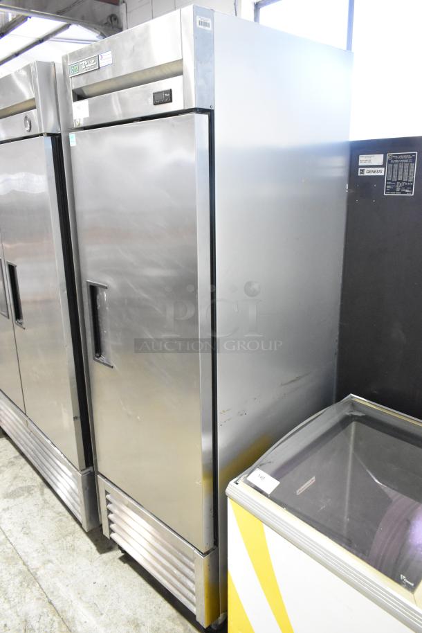 2018 True T-23-HC stainless steel commercial cooler with single door, poly-coated racks, and casters. Model details visible.