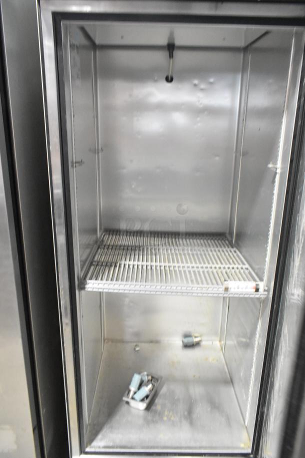 2018 True T-23-HC commercial cooler, stainless steel, single door, with poly-coated racks, on casters, 115 volts, 1 phase.