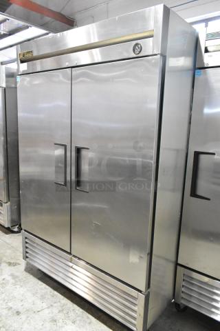 2016 True T-49 Stainless Steel Commercial 2 Door Reach In Cooler w/ Poly Coated Racks on Commercial Casters. 115 Volts, 1 Phase. - Item #1205111