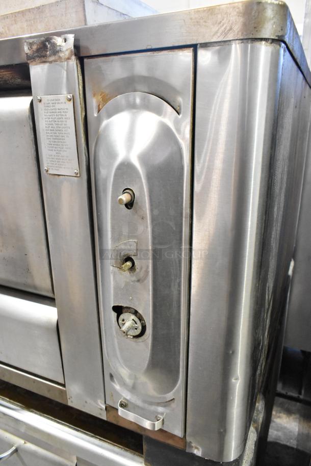 Blodgett 1000-S stainless steel commercial pizza oven, natural gas, single deck with stones, 60,000 BTU, visible wear.