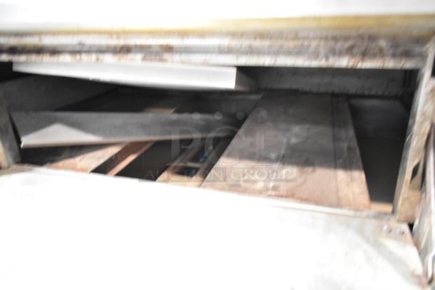 Blodgett 1000-S stainless steel commercial pizza oven interior with natural gas power, 60,000 BTU, featuring pizza stones.