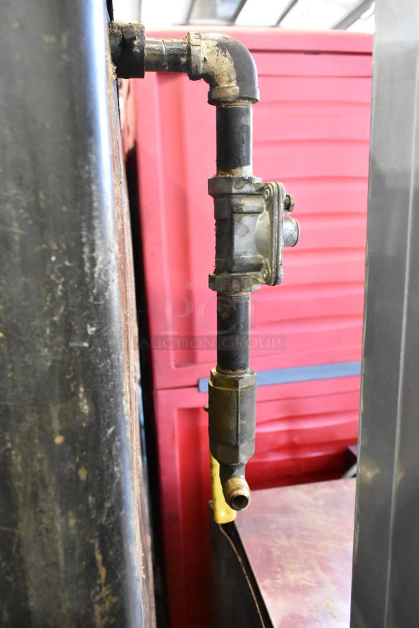 Natural gas pipe connection for a Blodgett 1000-S commercial pizza oven.