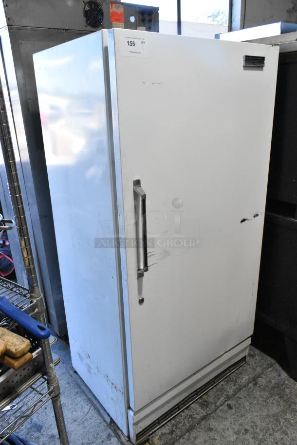 Sears Coldspot 106 metal reach-in freezer, single door, 115 volts, visible wear, labeled "155" and "PCIAuctions.com".