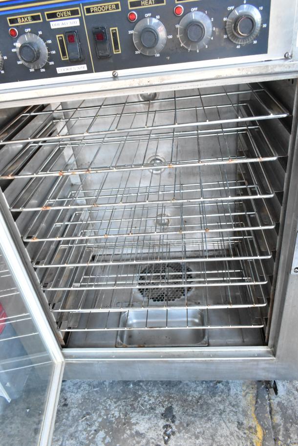 Nu Vu SUB-123 stainless steel commercial oven proofer, electric powered, 208 volts, 3 phase, on casters, visible controls.
