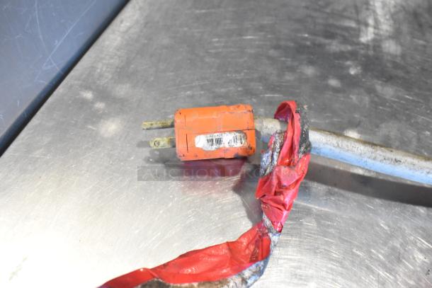 Metro C5 commercial heated holding cabinet, metal construction, on durable casters, visible power plug, tape-sealed cord.