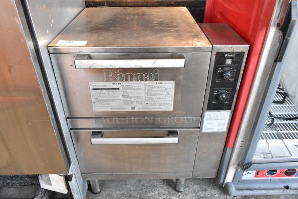 Rinnai stainless steel commercial gas-powered 2-drawer food warmer. Features digital controls and visible labeling. Good condition.