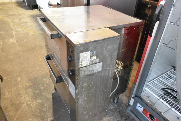 Rinnai stainless steel commercial gas 2-drawer food warmer, worn condition, visible labels with usage instructions.