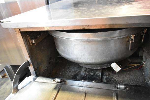 Rinnai stainless steel commercial gas-powered 2-drawer food warmer, showing interior drawer and heating element. Used condition.