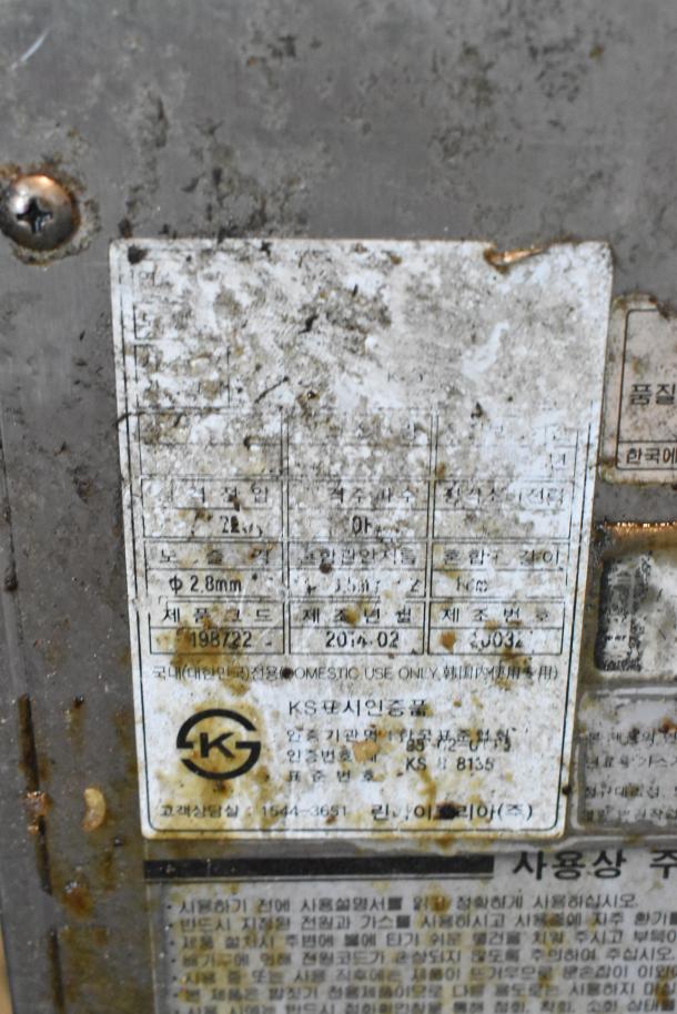 Rinnai Stainless Steel Commercial Gas 2 Drawer Food Warmer, visible wear and dirt, label indicates domestic use, model 198722.