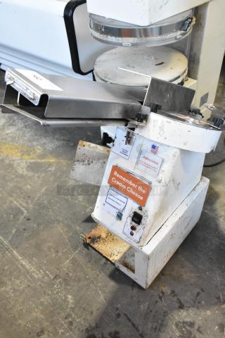 Oliver 702-N Metal Commercial Countertop Bagel Slicer, 115 Volts, 1 Phase, visible signs of use, "Remember the Cream Cheese" label.