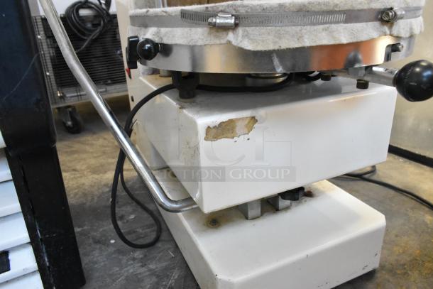 HD&Tek Sprizza metal pizza dough press, countertop model. Visible wear on exterior. 220 volts, 1 phase.