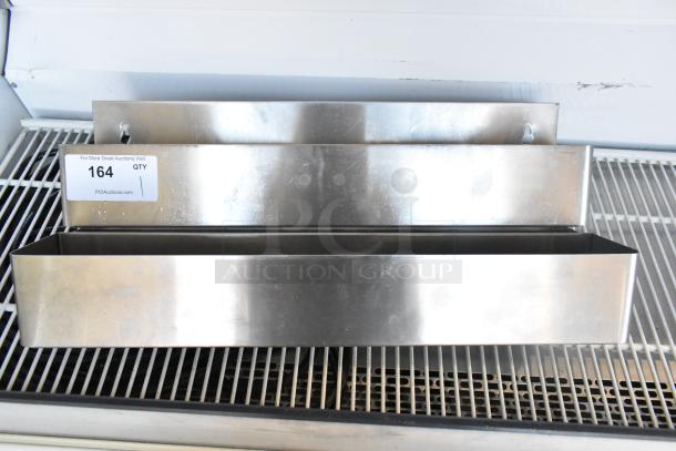 Stainless steel 2-well Speedwell with mounting holes, item tag "164", in good condition on auction shelf.