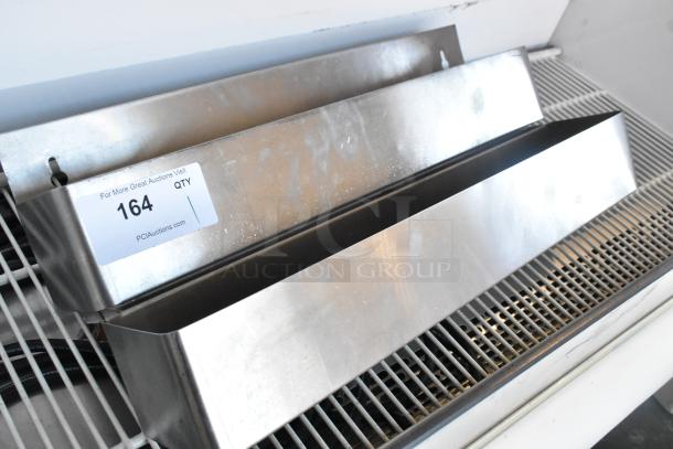 Stainless steel 2-well speedwell in good condition on a metal rack, labeled with auction number 164.