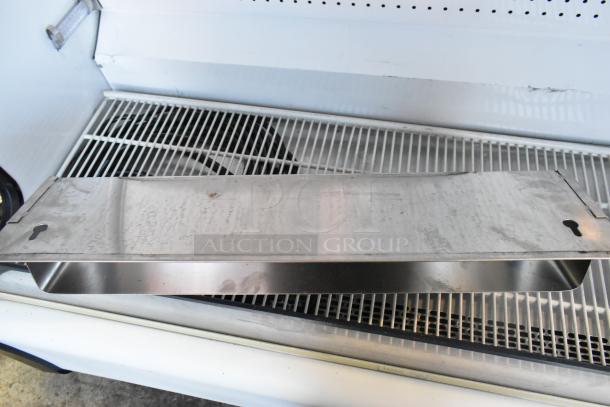 Stainless Steel 2 Well Speedwell, featuring dual compartments, used condition, slight surface wear visible.
