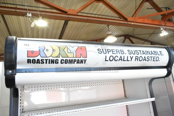 True TAC-48GS-LD merchandiser with Brooklyn Roasting Company branding. 208-230V, single-phase, metal build, clean condition.