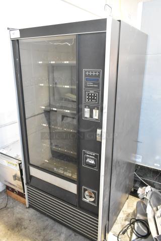 Genesis 5900 JR Metal commercial Floor Style Vending Machine. 115 Volts, 1 Phase. - Item #1205127
