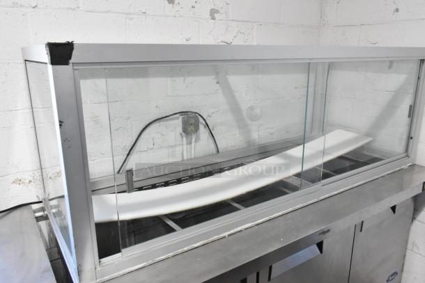 Atosa MSF8008 stainless steel commercial prep table with sneeze guard, on commercial casters, 115V, 1 phase.