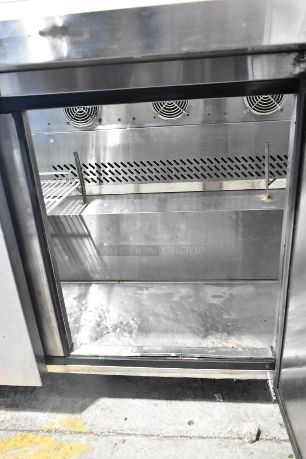 Atosa MSF8008 stainless steel commercial prep table with sneeze guard; on commercial casters; 115 volts, 1 phase.