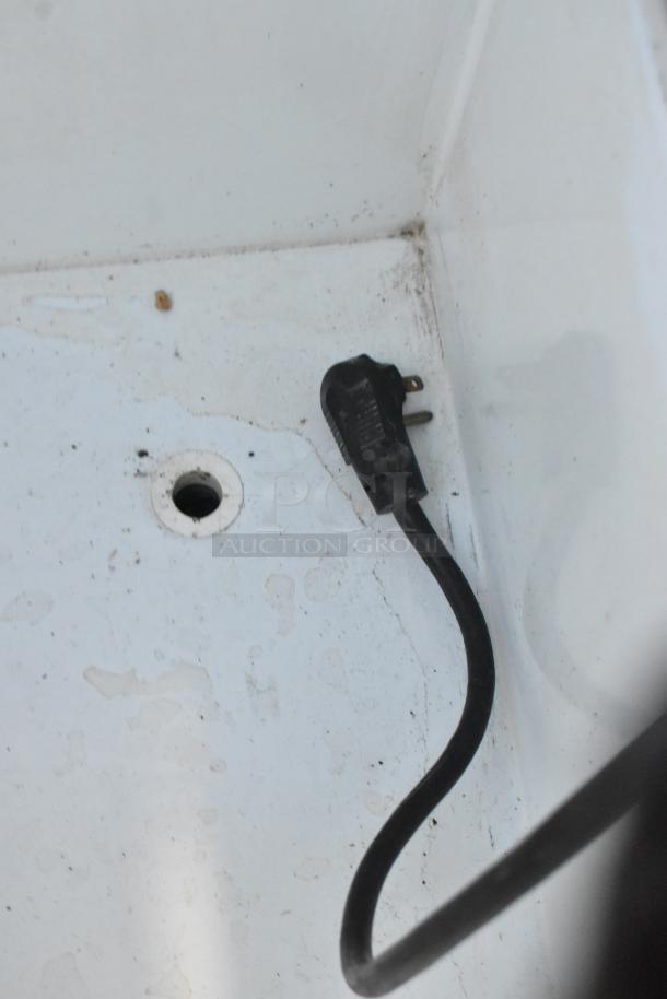 Metal commercial ice cream dipping cabinet, includes ice cream tub collars, requires 115 volts, 1 phase power.