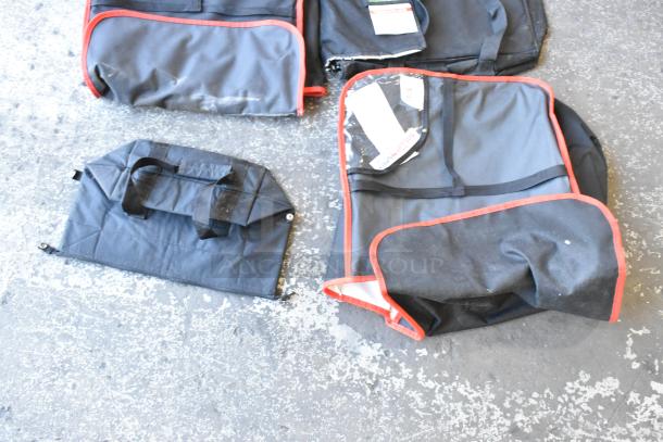 Seven hot food carrying bags, various sizes and styles, black with red trim, visible handles, used condition.