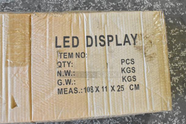 Cardboard box labeled "LED DISPLAY" with dimensions 108x11x25 cm, showing signs of wear. Includes item specs but no brand visible.