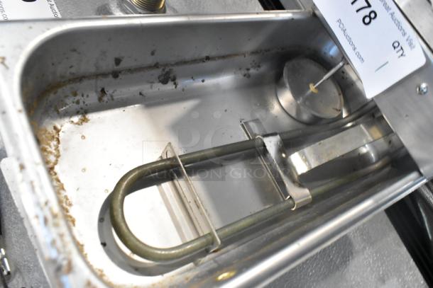 Supco CP802 metal condensate pan, 120 volts, 1 phase, showing signs of previous use with minor residue buildup.