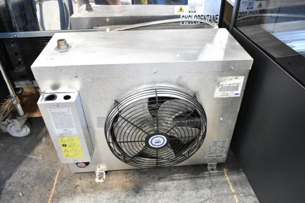 2018 Carrier CUR008ELBXE1SP metal commercial evaporator fan, features cooling fan, visible labels, good condition.