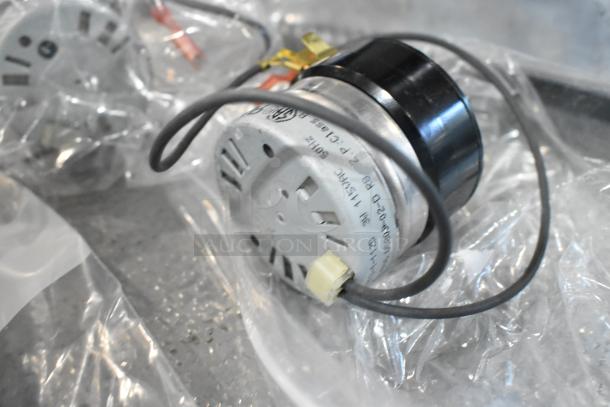 Four brand new Fenwal Controls Automatic Ignition System units, slight cosmetic defects, labeled with model details.