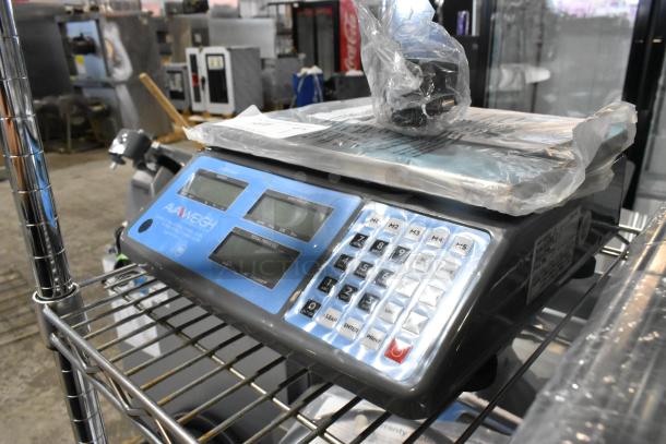 BRAND NEW AvaWeigh 334PCS60 60 lb. digital price computing scale with minor scratches; displays and keys intact.