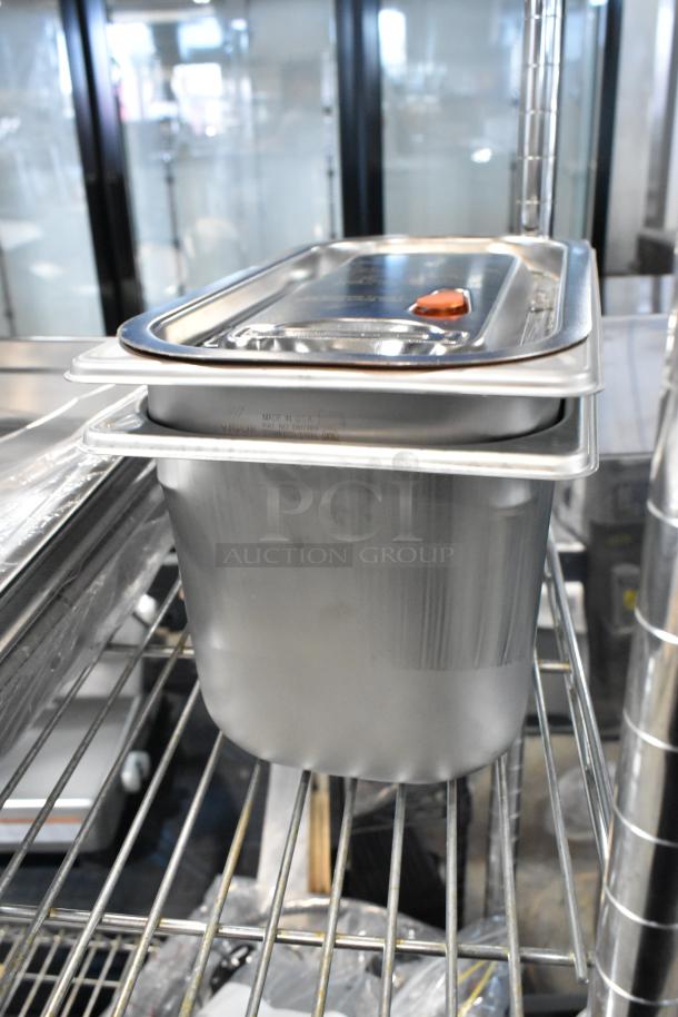 6 brand new anti-jam stainless steel steam table pans, including Choice full size 24 gauge and Vigor 1/3 size 22 gauge.
