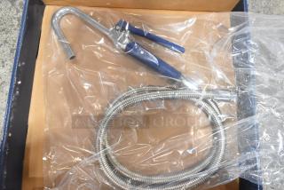 Brand new Waterloo 750PKFH68 pot and glass filler assembly, stainless steel hose, minor scratches, plastic packaging.