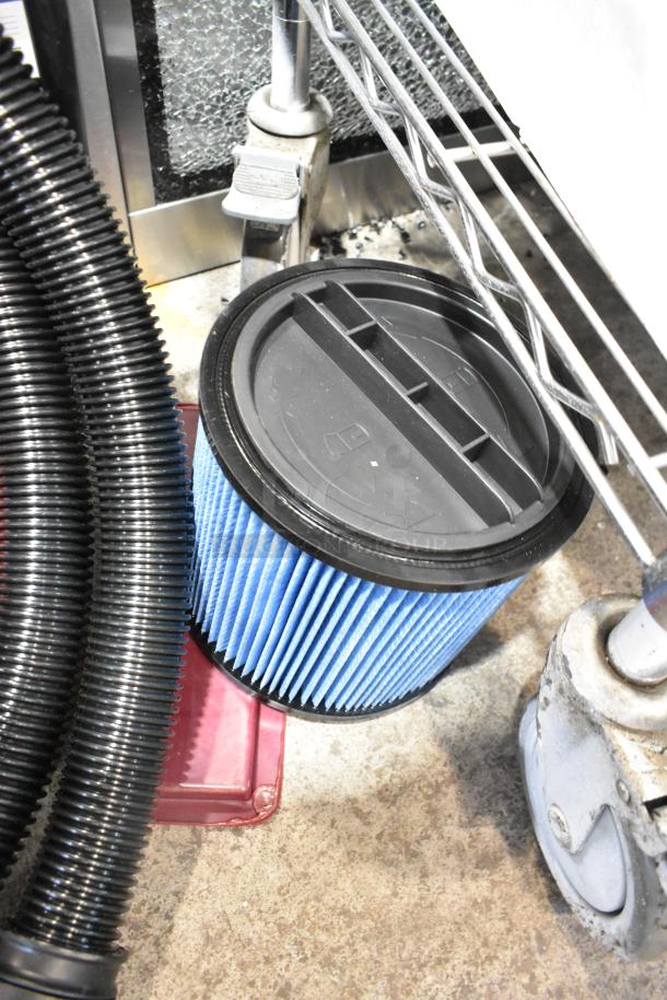 Dayton 61HV93 Drum Head, brand new scratch and dent, 120V, 1 phase, visible coiled hose and filter, minor cosmetic marks.