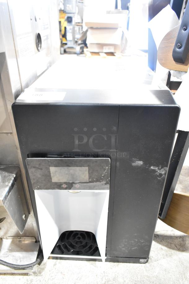 Brand new Follett 15CI112A-IW-CL-ST-00 countertop ice maker and water dispenser, 15 lb. bin, 100 lb. capacity, 115V, 1 Phase.