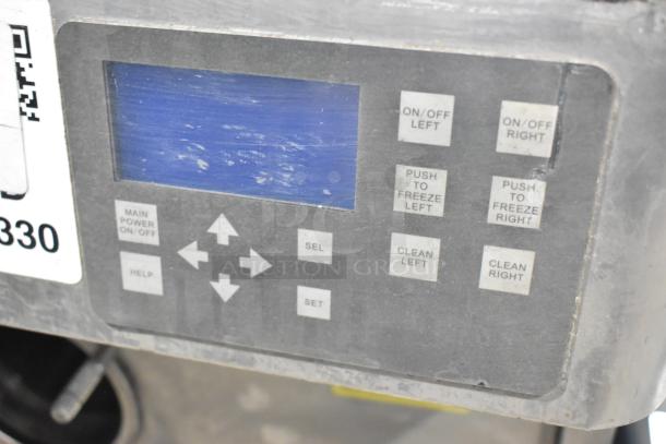 Stoelting SF121-38I2 soft serve machine control panel with labeled buttons and display. Stainless steel, commercial use.