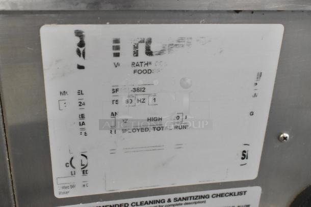 Stoelting SF121-38I2 label indicates model, 208-240V, 1 phase. Stainless steel; for commercial soft serve ice cream.