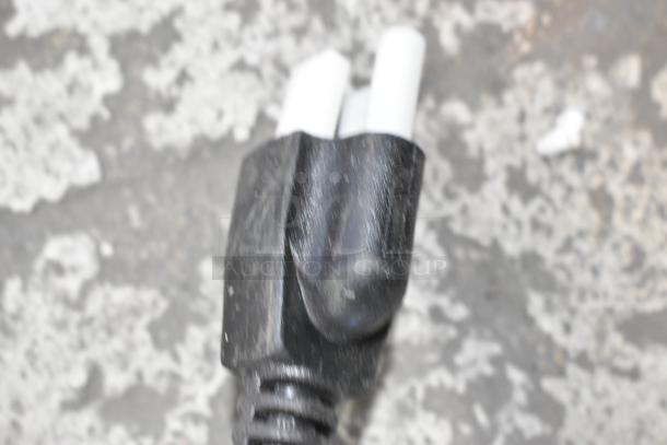 Close-up of a power plug for a 2024 Hobart Centerline EMM10 commercial dough mixer, emphasizing its connection type.