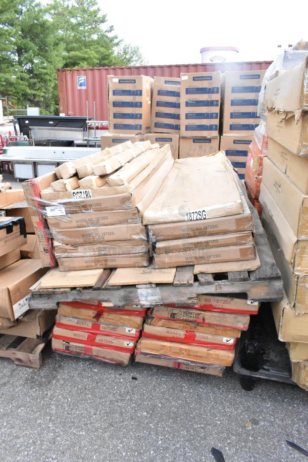 40 boxes of brand new scratch and dent items, including 1872SG 18x72 wire shelves, P52GY poles, 1872SS shelves. Labels visible.