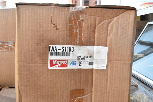 Box labeled "Metro IWA-S11K3 Slanted Lid Drying Rack" showing minor creases; brand new, 20 items in auction lot.