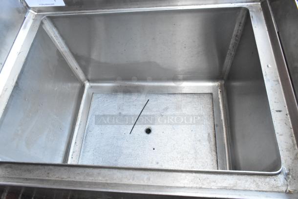 EUBIB-2418CP stainless steel ice bin with cold plate, showing interior, clean condition, slight surface wear.