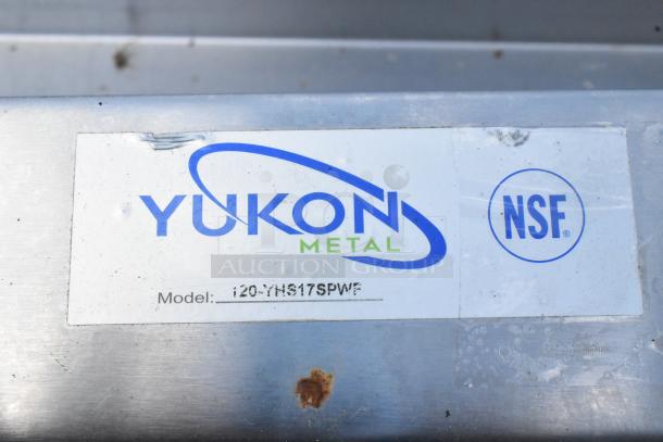 Yukon stainless steel sink label, model 120-YHS17SPWF, NSF certified, features side splash guards, faucet, handles.