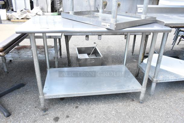 Two stainless steel tables with metal under shelves. Sizes 48x30x34 and 30x24x34. Used condition. Auction lot includes both tables.