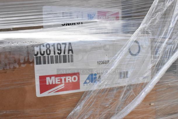 22 brand new scratch and dent items including Metro CC8197A and Metro 1830NC shelf, wrapped in plastic film, with labels visible.