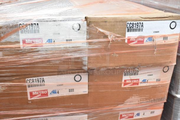 28 brand new scratch and dent Metro CC8197A shelves, boxed in sets of 4, labeled with model and quantity.