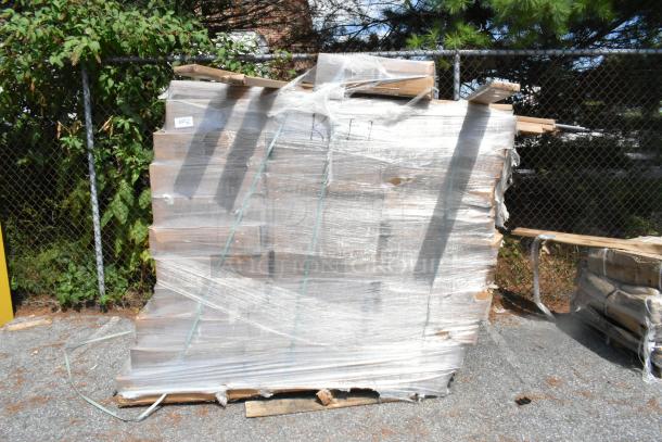 Pallet of 42 new scratch and dent items, including 2448GY 24x48 wire shelves and P74GY poles, wrapped in plastic.