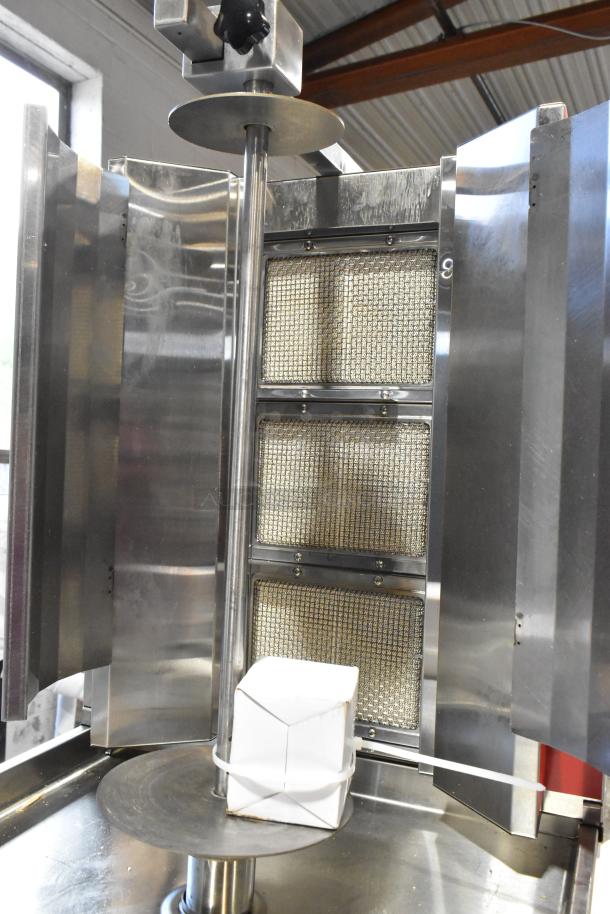 Brand new Avantco 177VB203 stainless steel gas vertical broiler, 65 lb. capacity, 28,500 BTU, minor scratches shown.