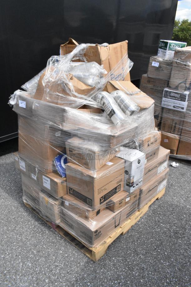 Pallet of 22 new scratch-and-dent items, including a fryer basket, syrup pump, and chair mat, wrapped in plastic.