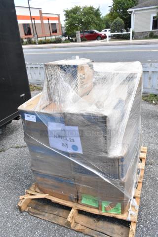 Shrink-wrapped pallet with boxes of paper towel rolls, lids, and cups labeled "June-23." Some boxes marked as scratch and dent.