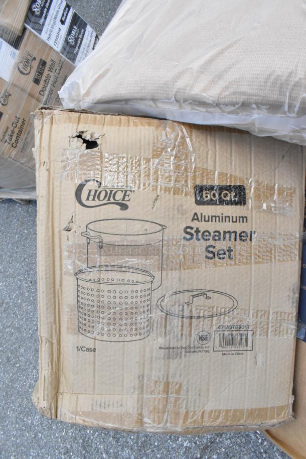 Cardboard box with Choice 60 Qt Aluminum Steamer Set, visible scratches, dents on packaging. Contains stock pot and trays.